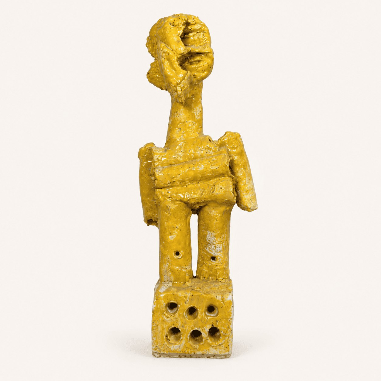 Idole en terre cuite émaillée jaune, 50 cm